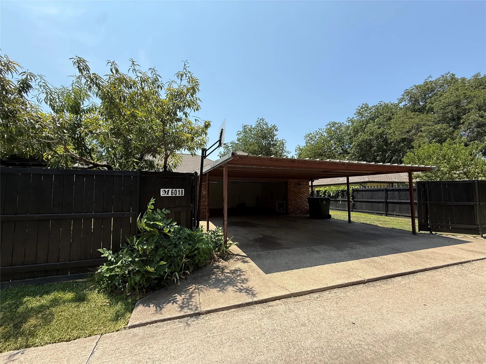 Attached carport with a metal roof