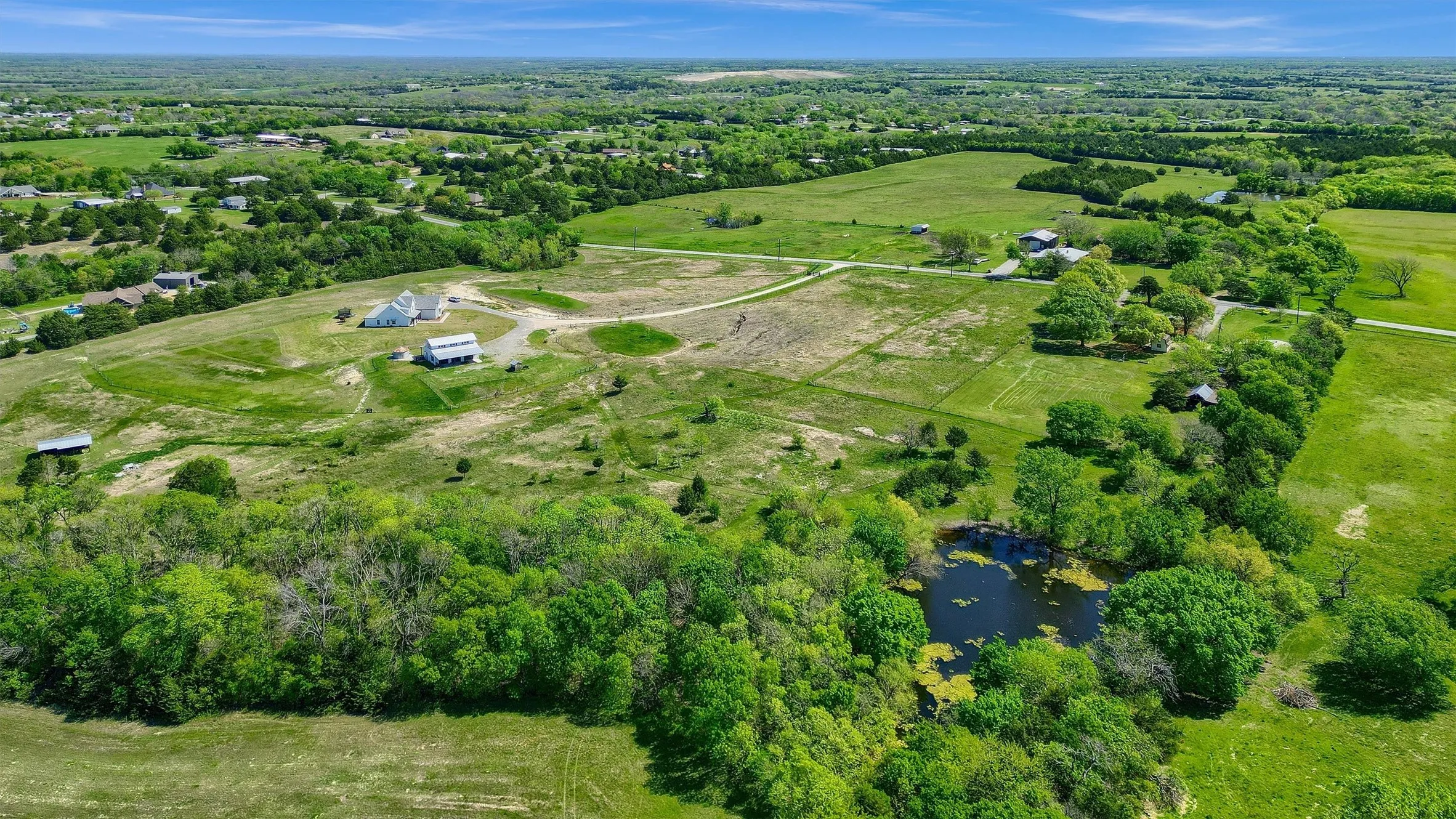 Bird's eye view with a rural view and a water view