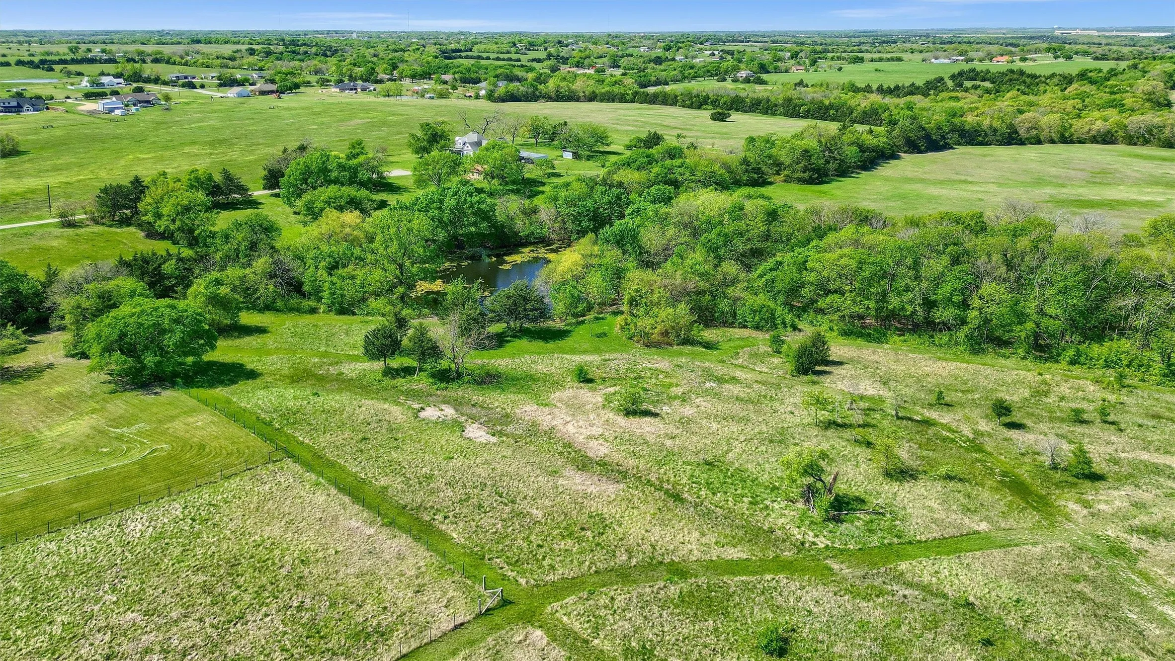 Drone / aerial view featuring a rural view and a water view