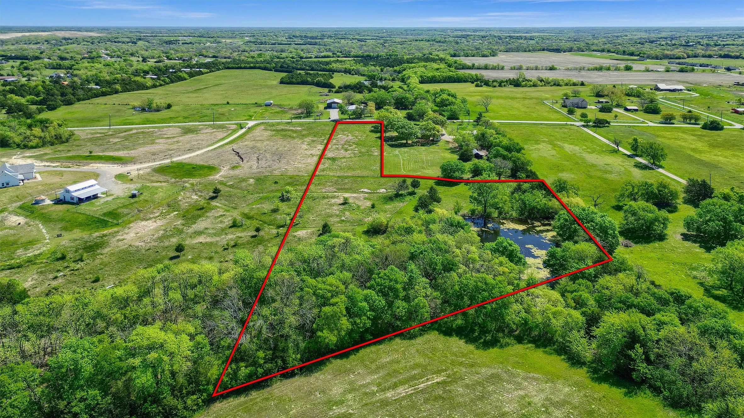 Drone / aerial view featuring a rural view. Boundaries are approximate.