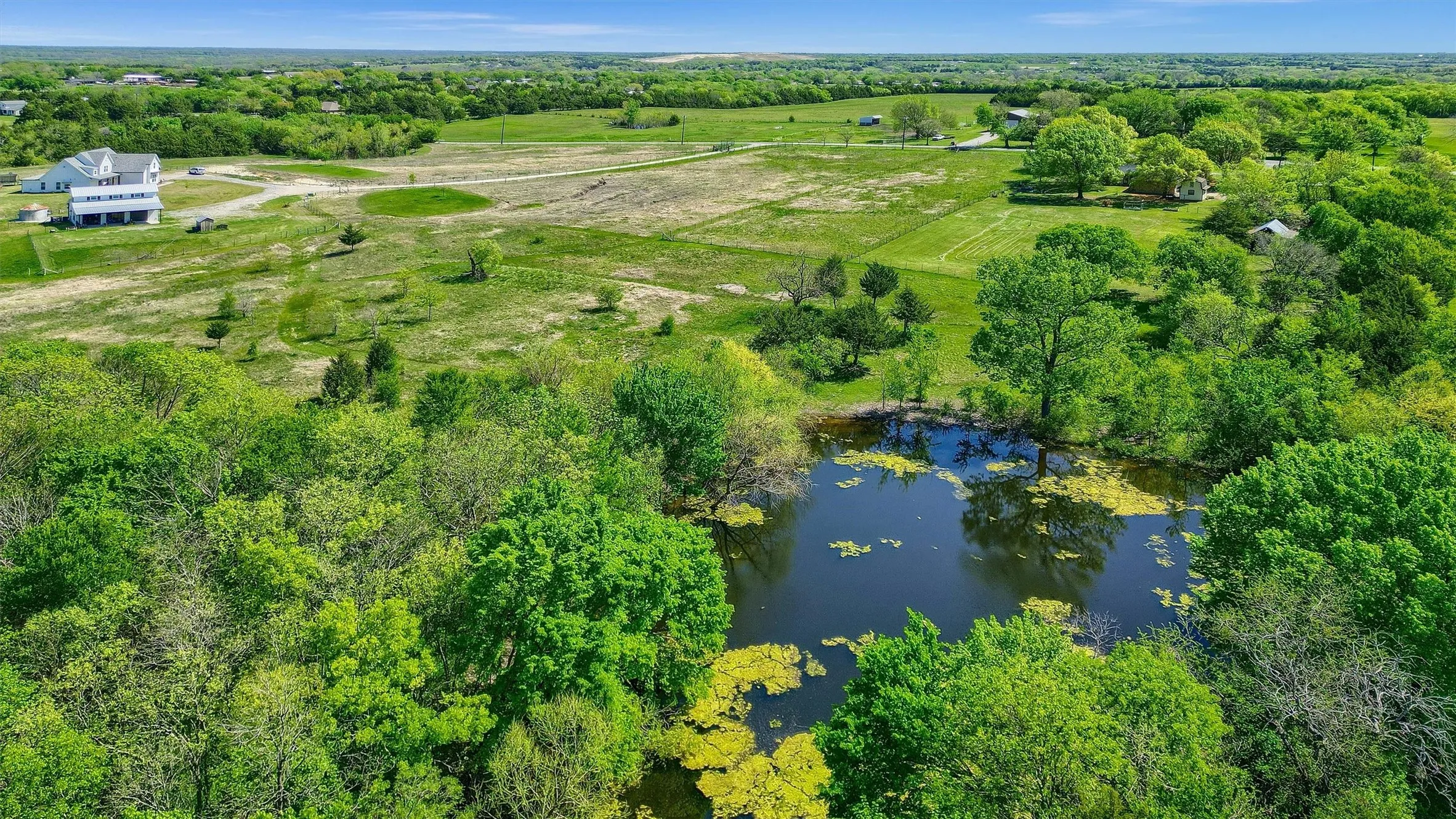 Bird's eye view with a rural view and a water view
