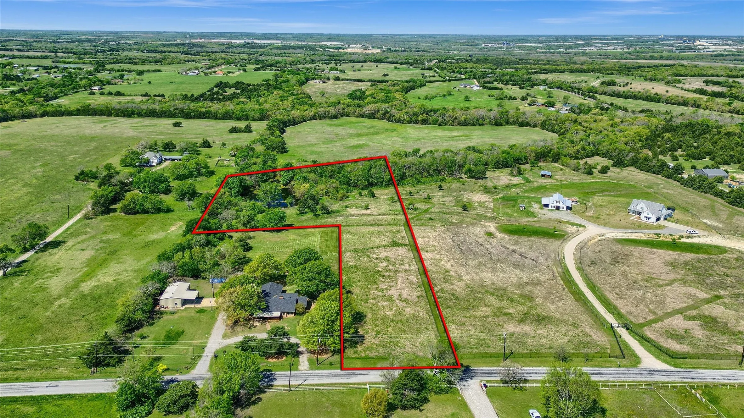 Birds eye view of property featuring a rural view. Boundaries are approximate.