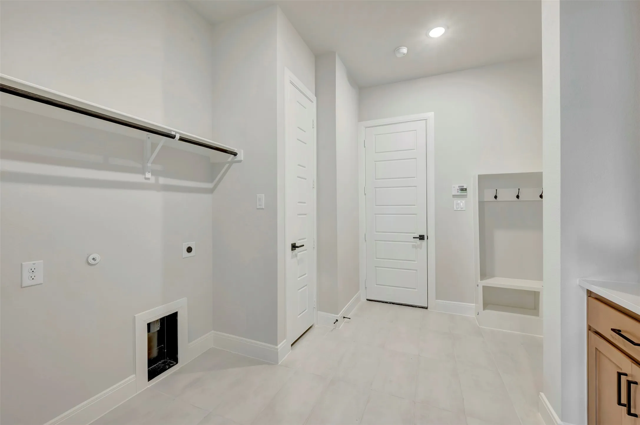 Laundry area featuring electric dryer hookup, recessed lighting, and hookup for a gas dryer