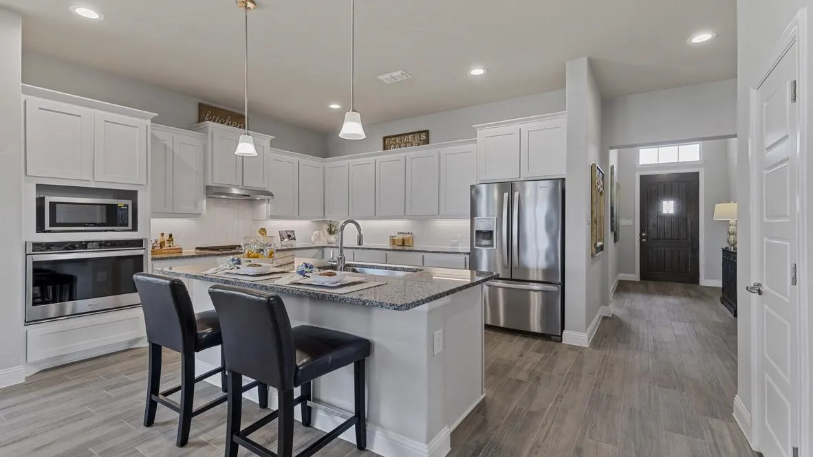 Kitchen- All Home and community information, including pricing, included features, terms, availability and amenities, are subject to change at any time without notice or obligation. All Drawings, pictures, photographs, video, square footages, floor plans, elevations, features, colors and sizes are approximate for illustration purposes only and will vary from the homes as built.