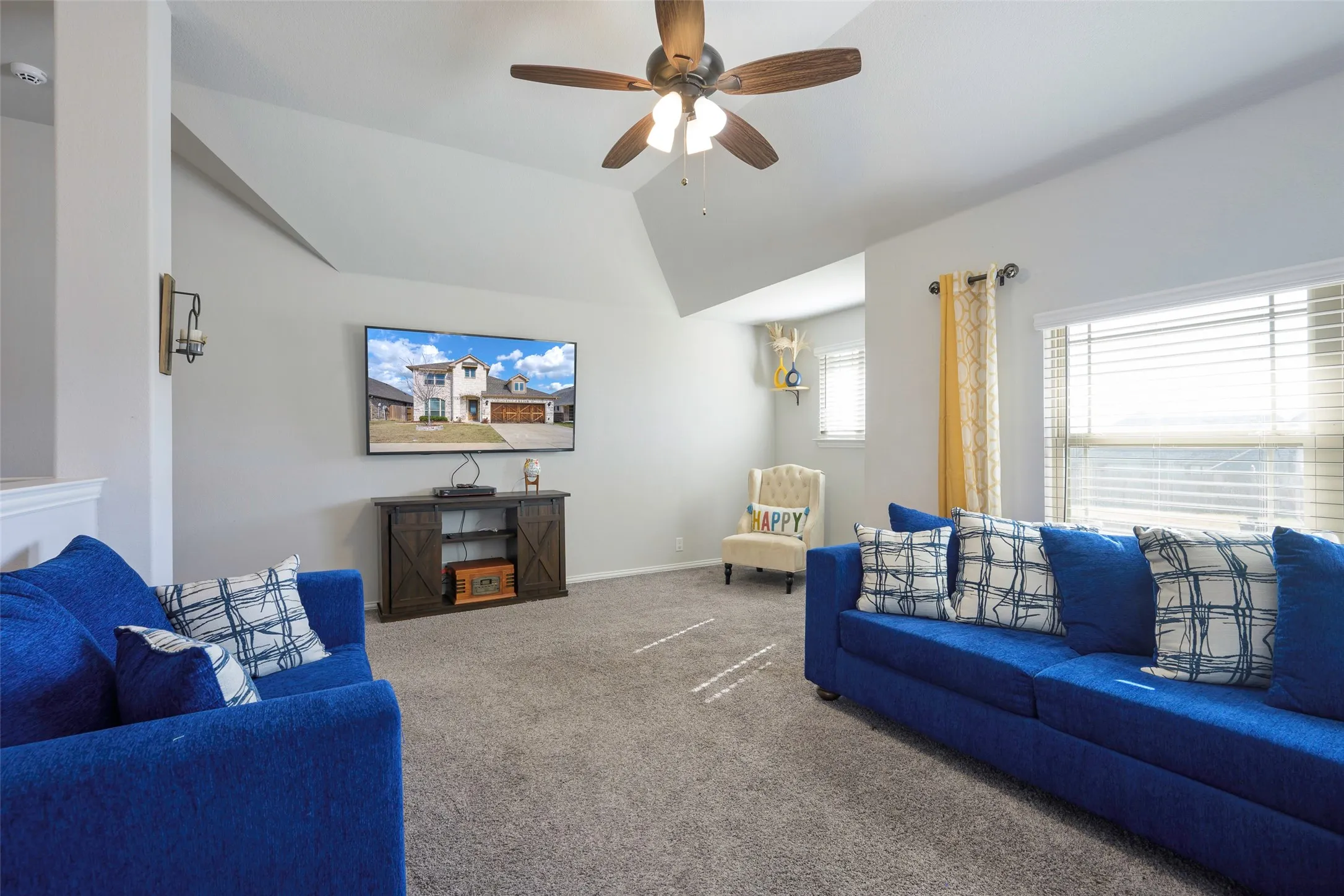 2nd Level Living room with carpet, a ceiling fan, and vaulted ceiling