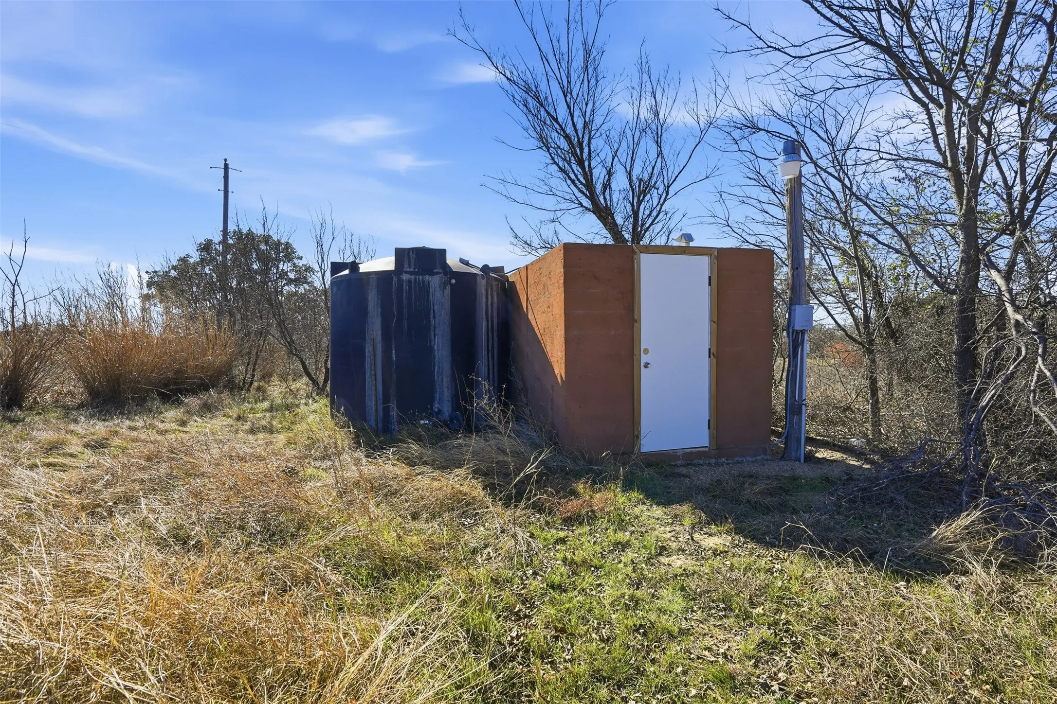 Well #! with well house and 2500 gallon tank