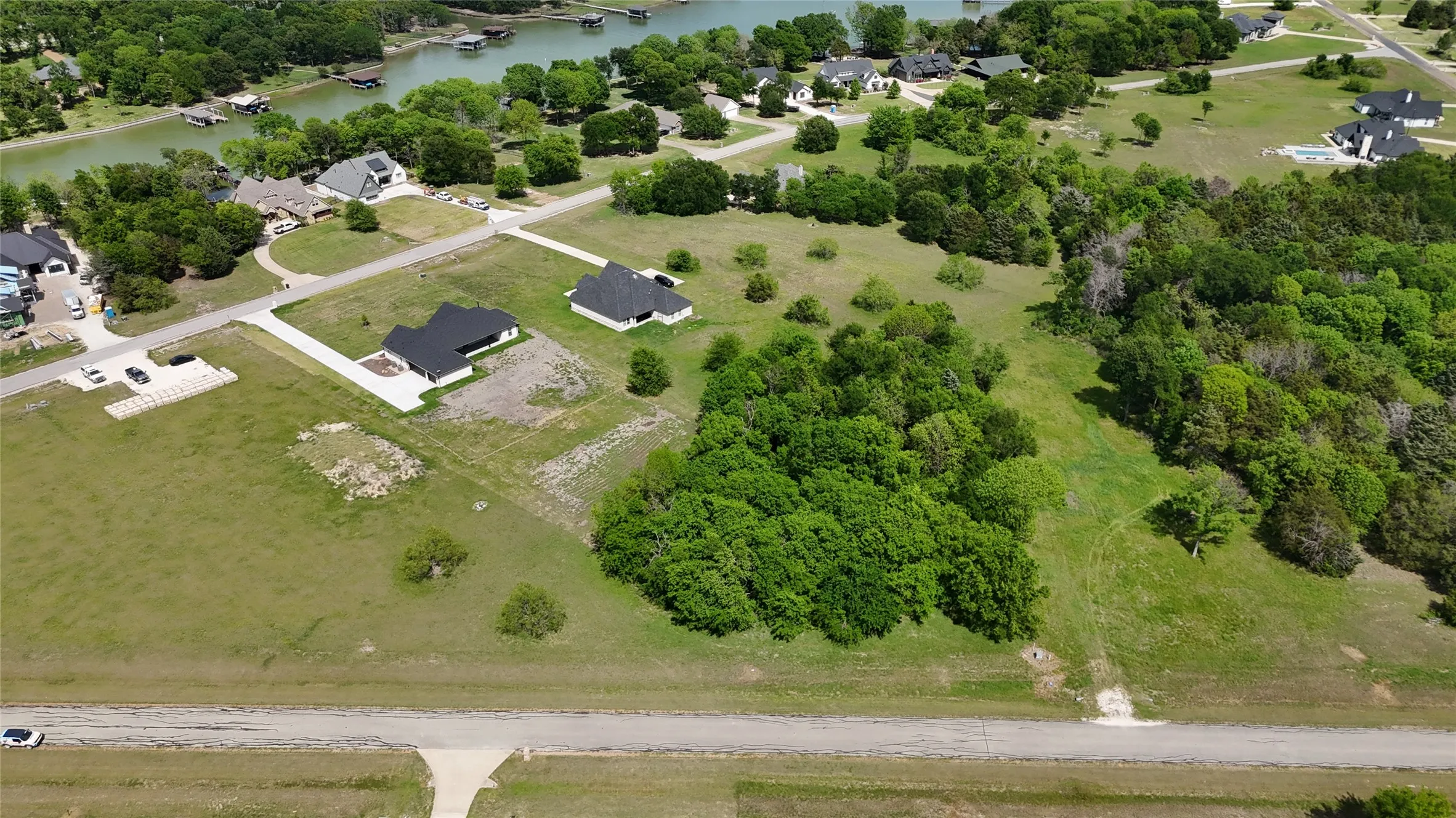 Wooded Lot 194 offers privacy within an established lake community, ideal for buyers considering retirement or relocation to Richland Chambers Lake.