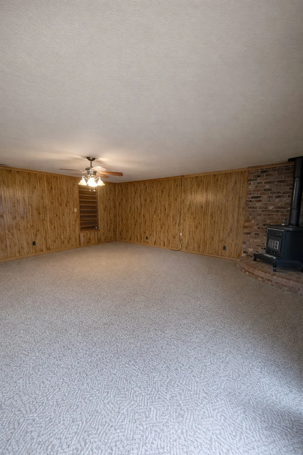 family room with wood burning stove