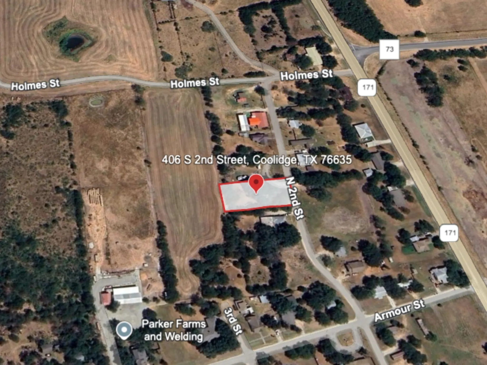 Aerial overview of property's location with property boundaries highlighted