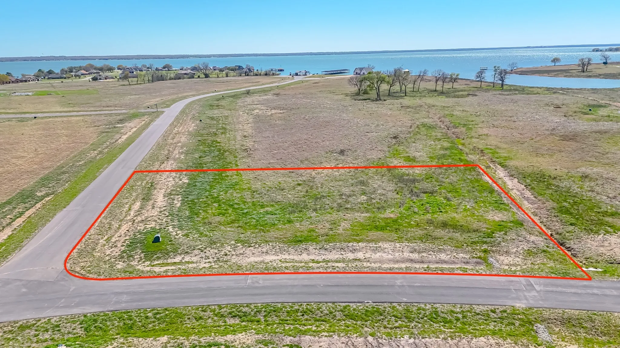 Outlined 1.170 acre lot and a view of the lake