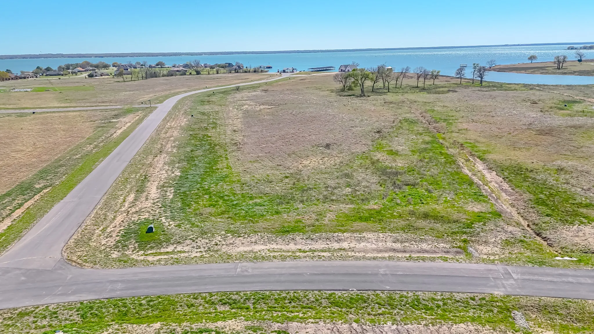 Lot with easy access to the community club house, boat dock, ramp and community pool.