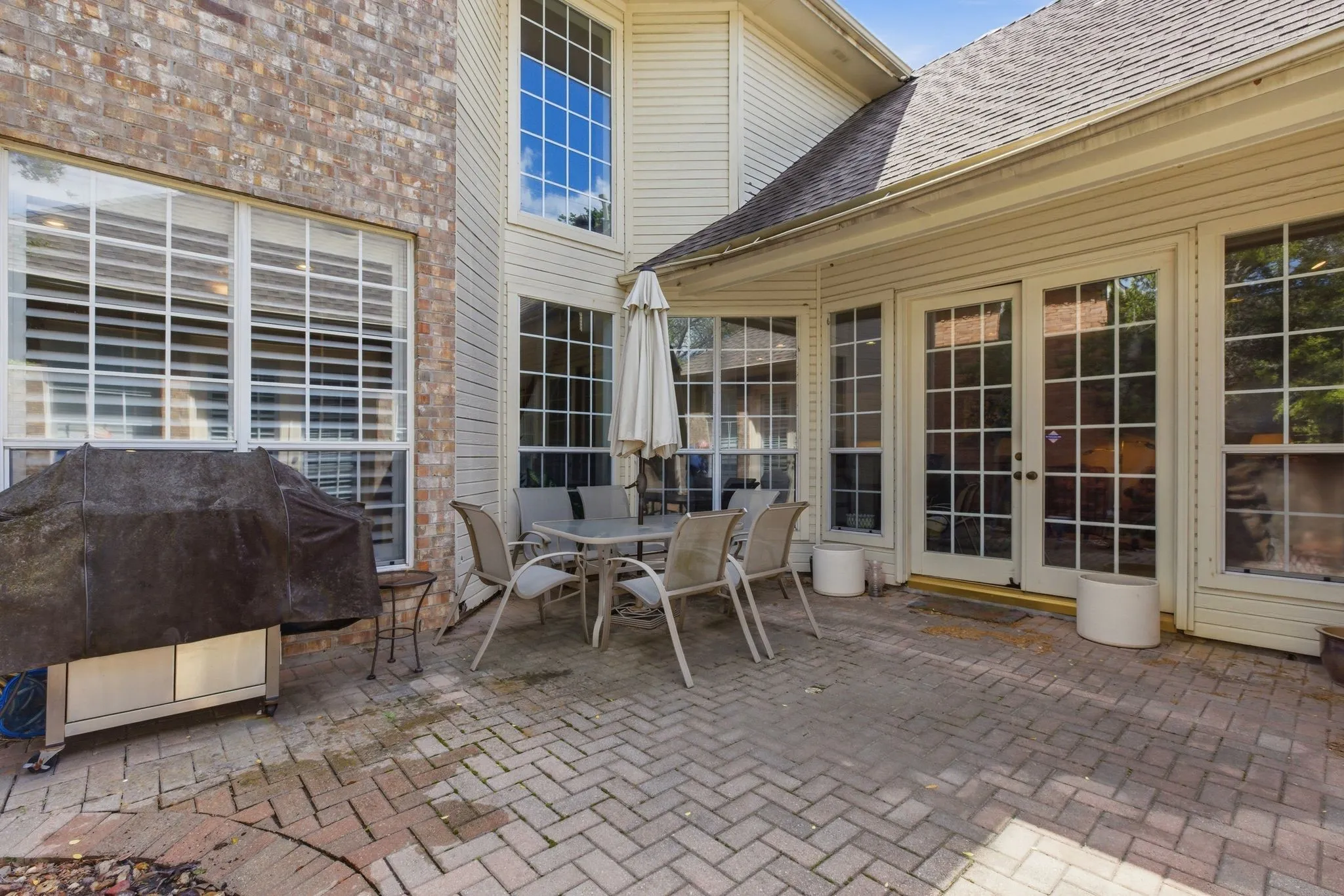 View of patio / terrace featuring outdoor dining space, french doors, and area for grilling