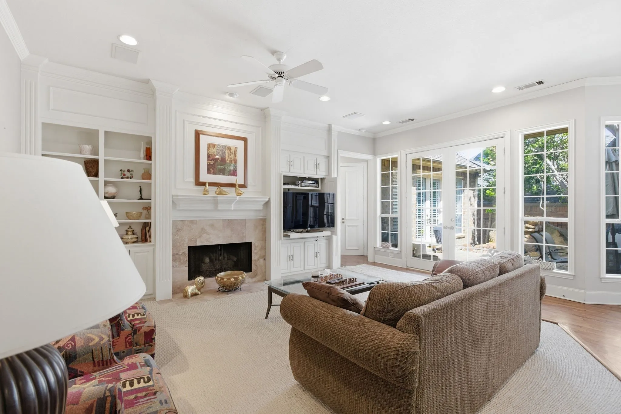  featuring fireplace and a wall of windows