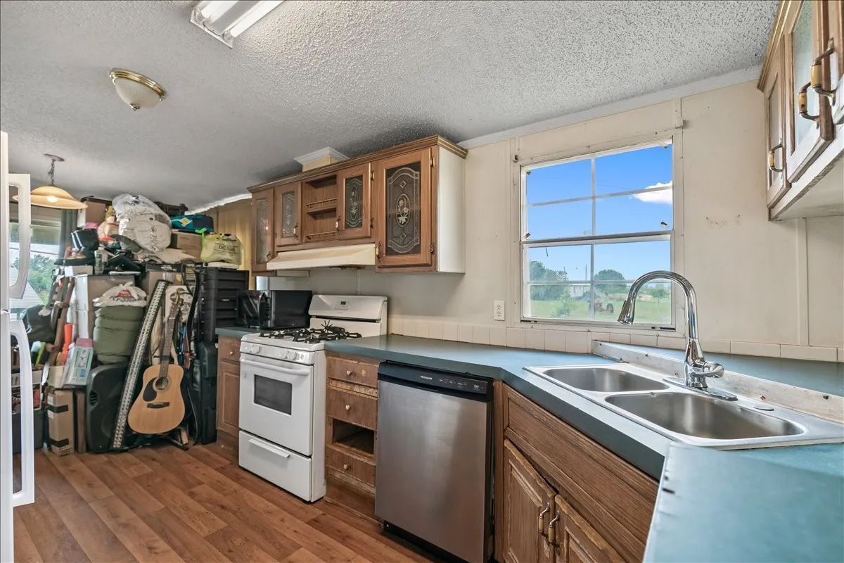 Manufactured Home For Sale in Johnson County , 5680 County Road 1217, Cleburne, Texas 76033, 3 Bedroom, 2 Bathroom, Garage spaces, 1,736 Sqft, built in 1996, Preowned, mls#21153868, Real Estate Agent in Cleburne, Homes For Sale in Johnson county, Homes For Sale in Cleburne, Realtor in Cleburne Texas, Real Estate Brokerage Independent Realty Texas, Luminita Cordes Realtor