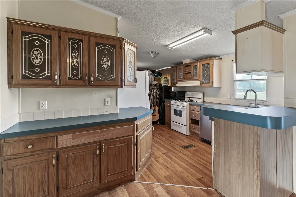 Manufactured Home For Sale in Johnson County , 5680 County Road 1217, Cleburne, Texas 76033, 3 Bedroom, 2 Bathroom, Garage spaces, 1,736 Sqft, built in 1996, Preowned, mls#21153868, Real Estate Agent in Cleburne, Homes For Sale in Johnson county, Homes For Sale in Cleburne, Realtor in Cleburne Texas, Real Estate Brokerage Independent Realty Texas, Luminita Cordes Realtor