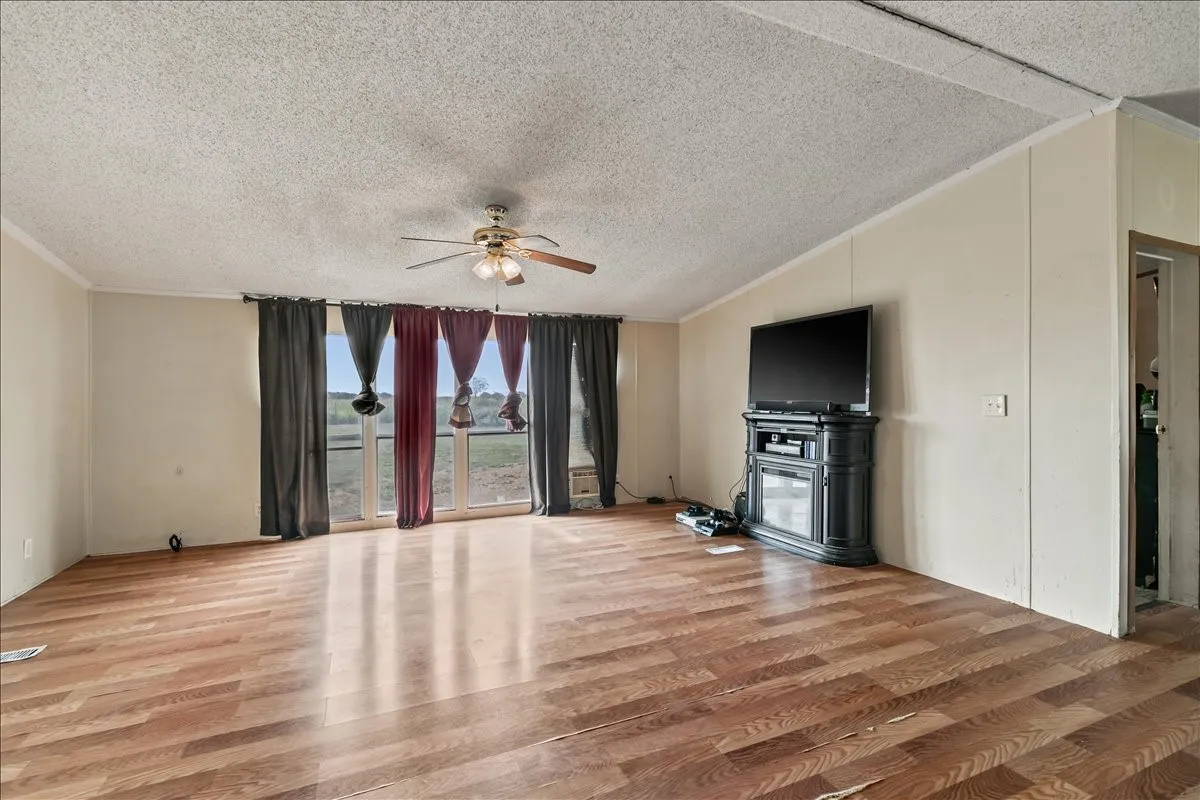 Manufactured Home For Sale in Johnson County , 5680 County Road 1217, Cleburne, Texas 76033, 3 Bedroom, 2 Bathroom, Garage spaces, 1,736 Sqft, built in 1996, Preowned, mls#21153868, Real Estate Agent in Cleburne, Homes For Sale in Johnson county, Homes For Sale in Cleburne, Realtor in Cleburne Texas, Real Estate Brokerage Independent Realty Texas, Luminita Cordes Realtor