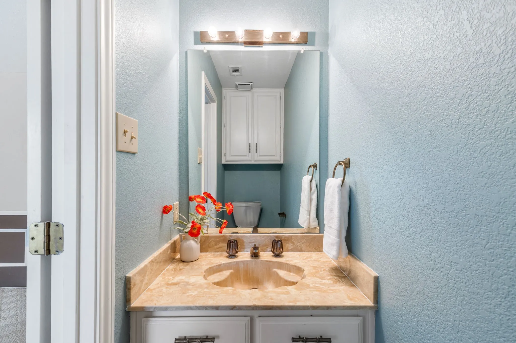Half bath with direct access from living room