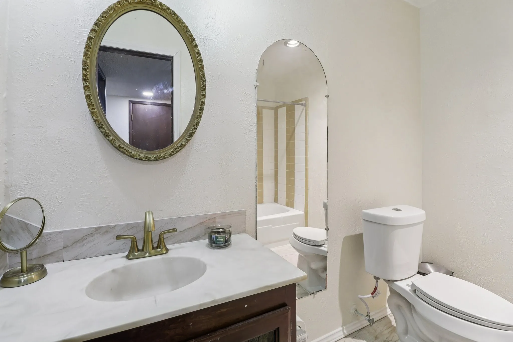 Bathtub resurfaced, flooring and toilet replaced.