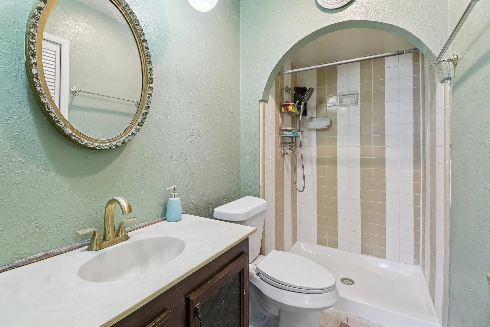Shower pan resurfaced. Flooring and toilet replaced.