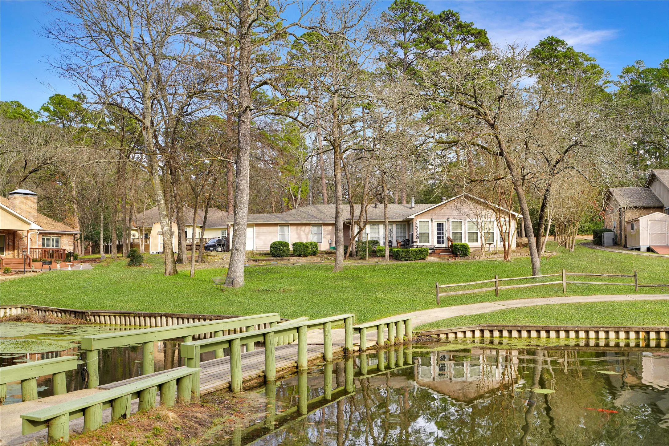 Dock with a water view and a residential view