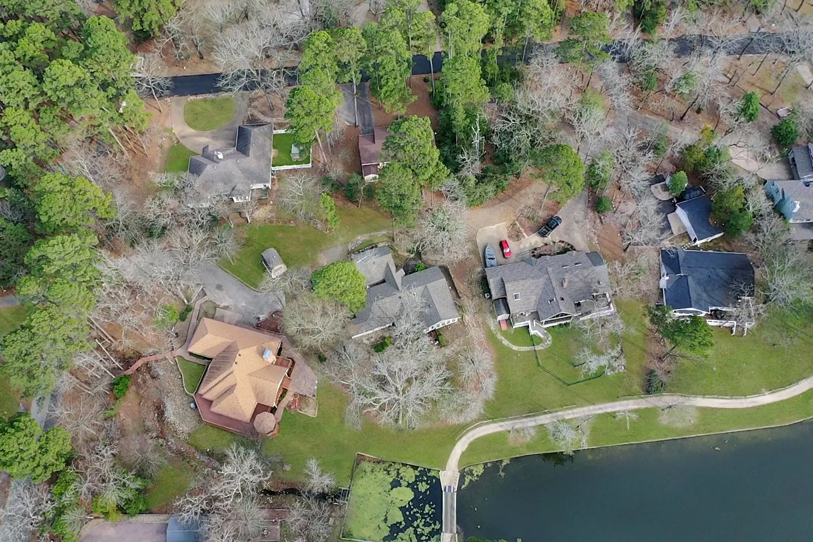 Aerial overview of property's location with nearby suburban area
