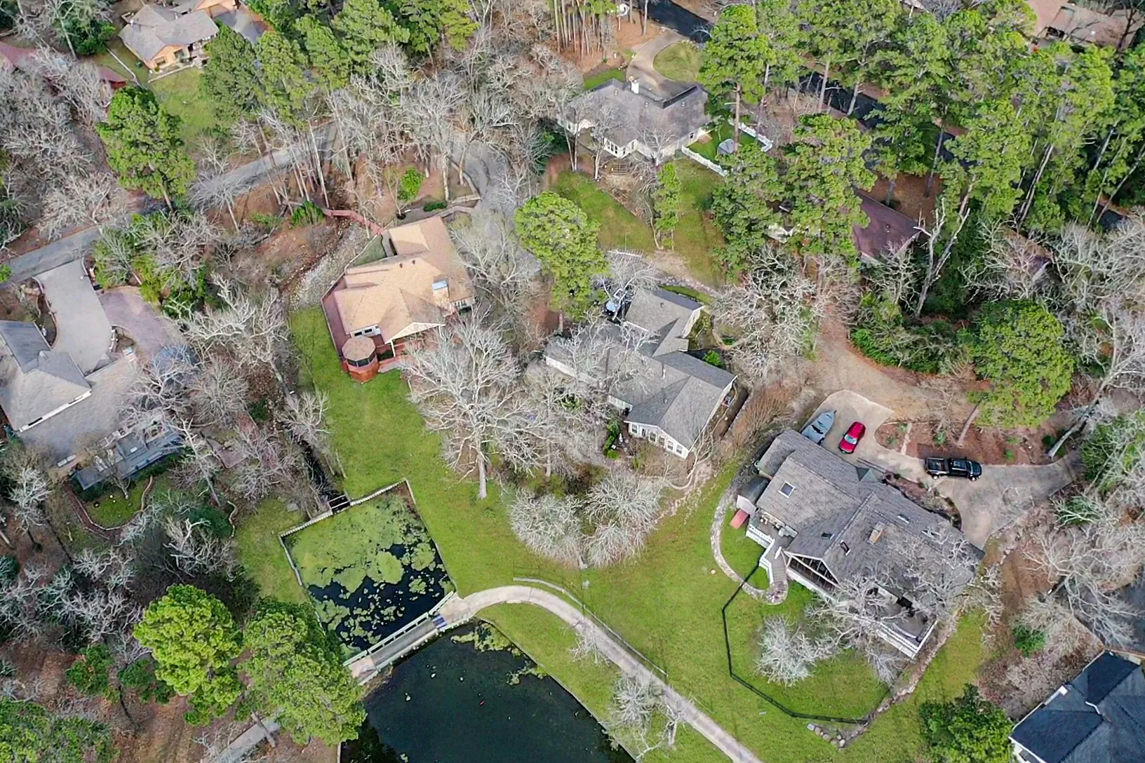 Aerial view of property's location featuring nearby suburban area