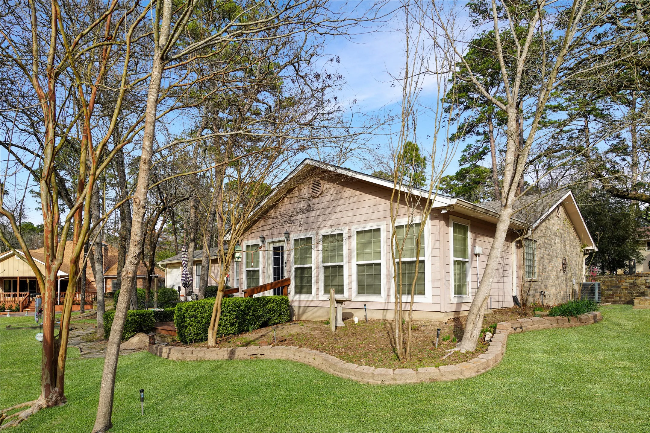 View of front of home featuring a front lawn