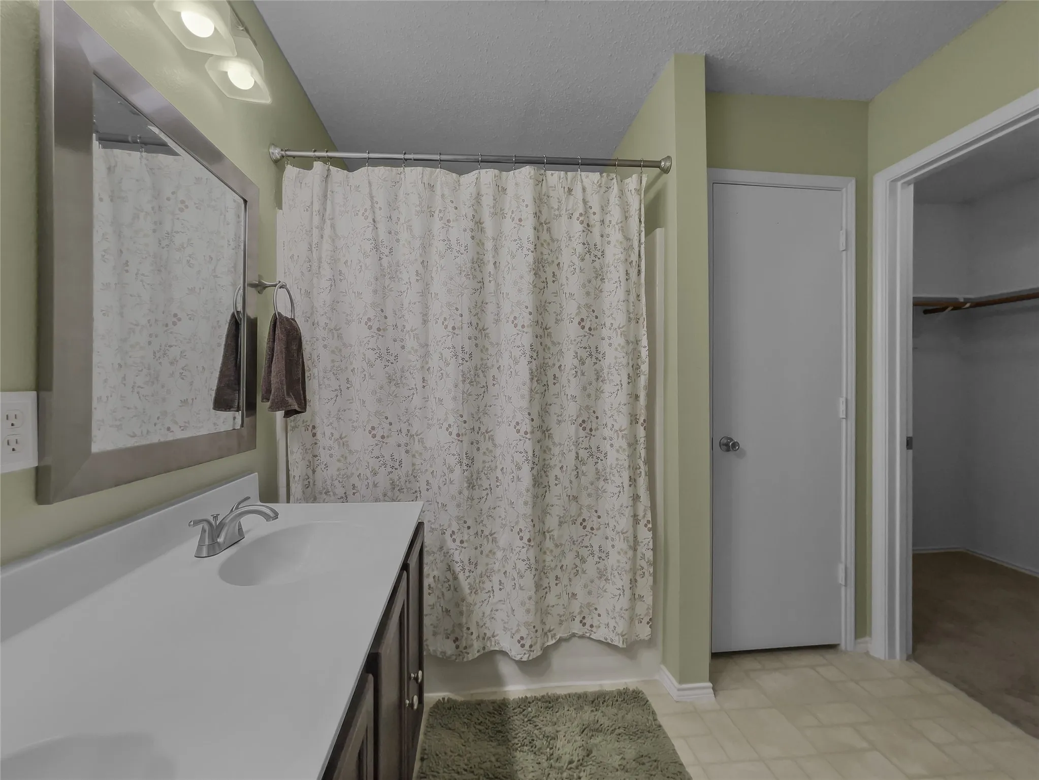 Her master closet and master bath