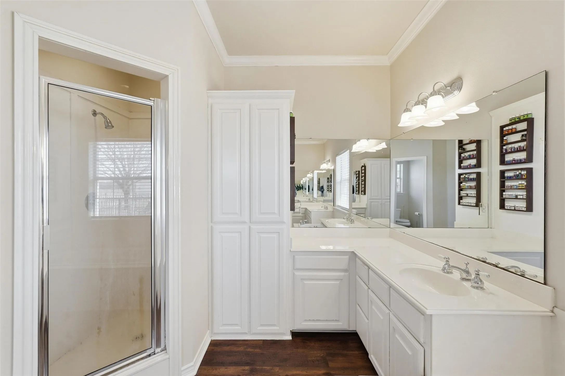 Separate shower and two closets in this primary bath.