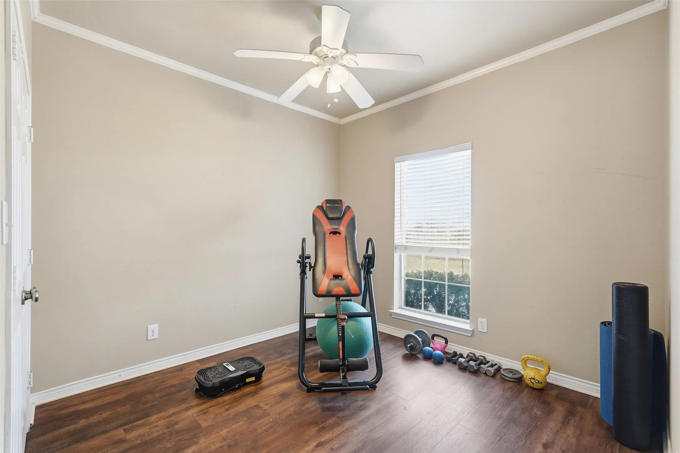 Secondary bedroom currently used as exercise room.