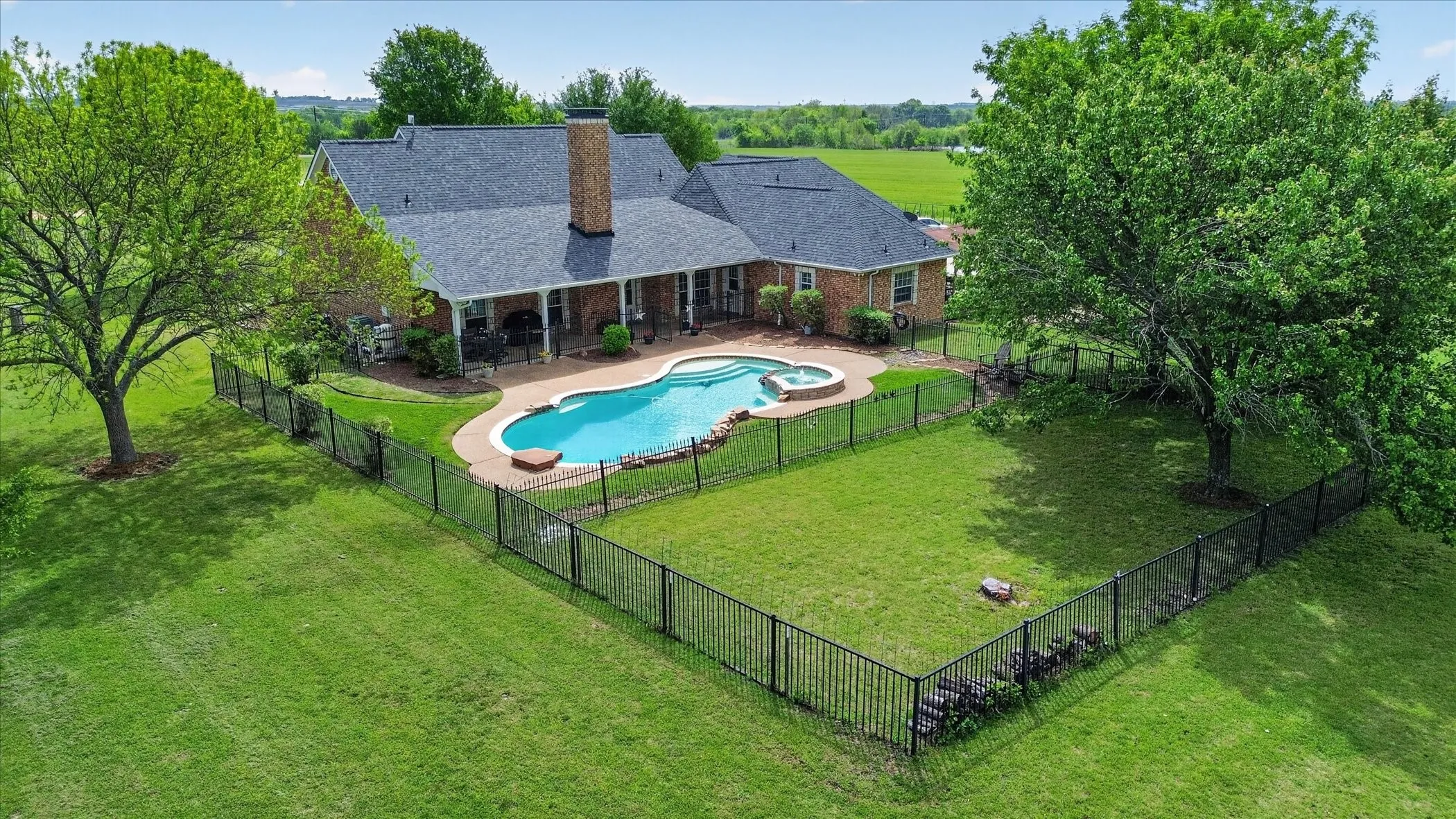 Note the perimeter fences around the pool and area beyond for pets.