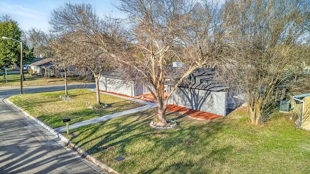 View of front of property with a front lawn