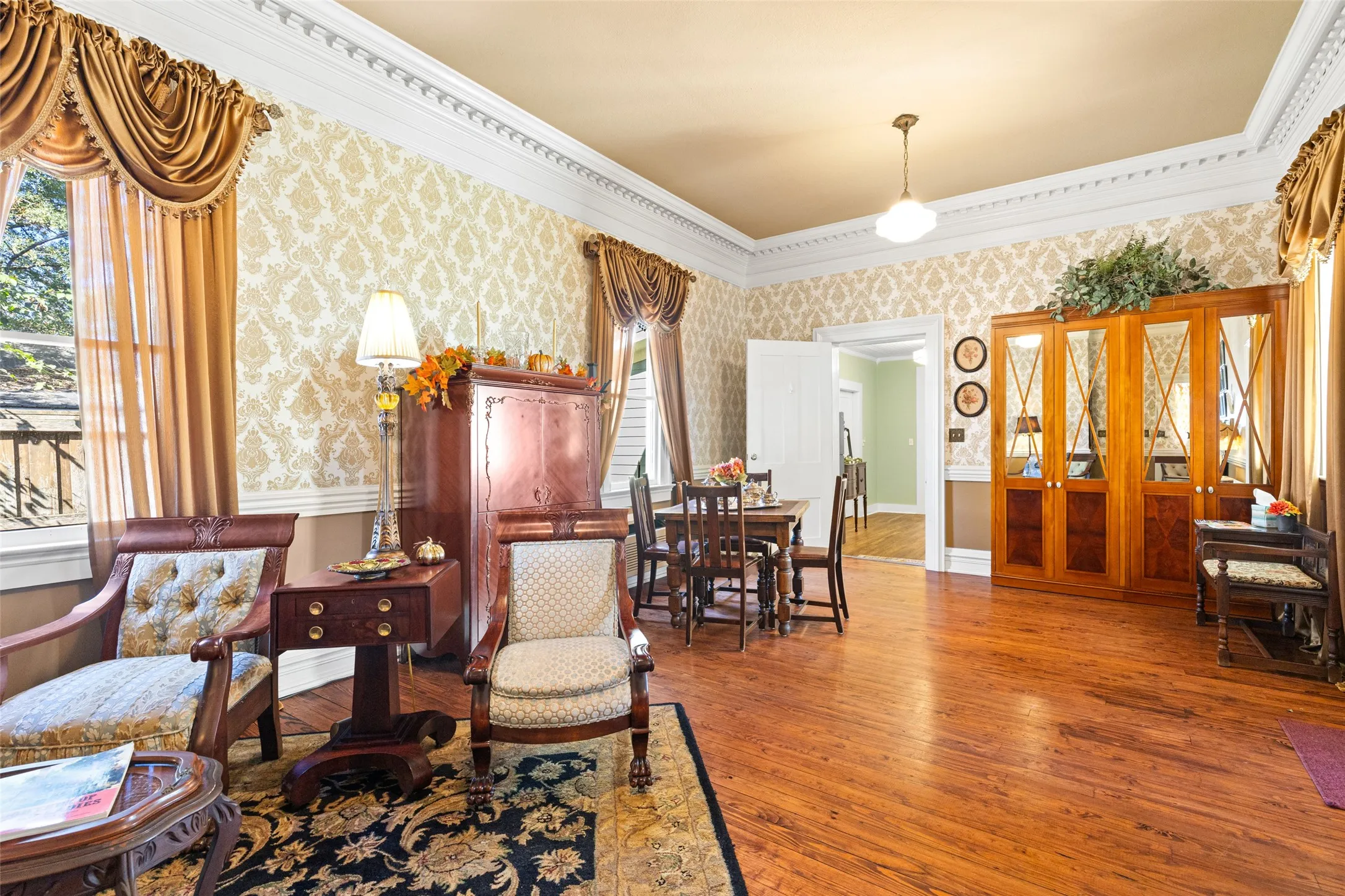 Living room -parlor with triple crown molding, original hardwoods