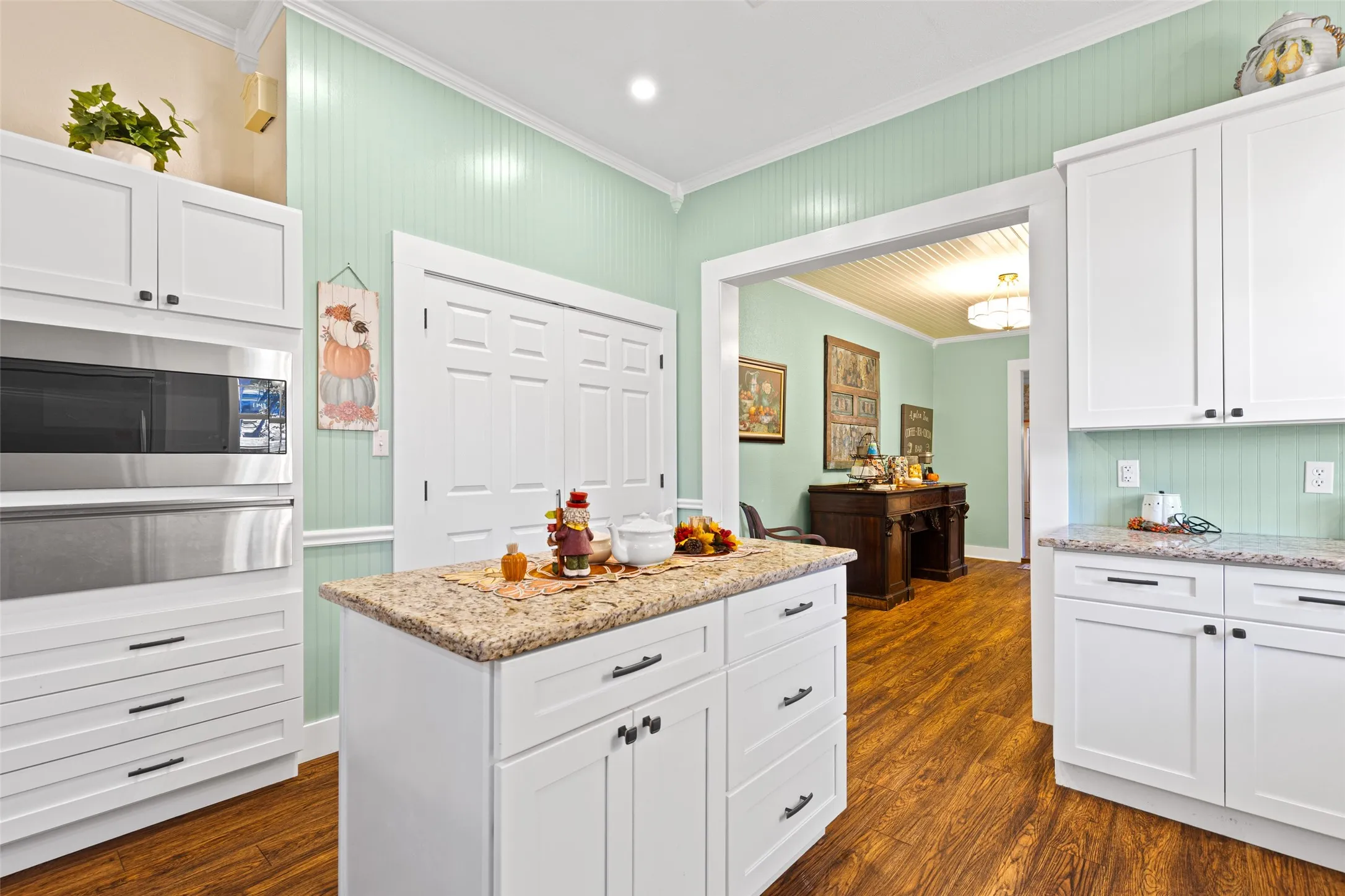 kitchen view showing island and warming drawer