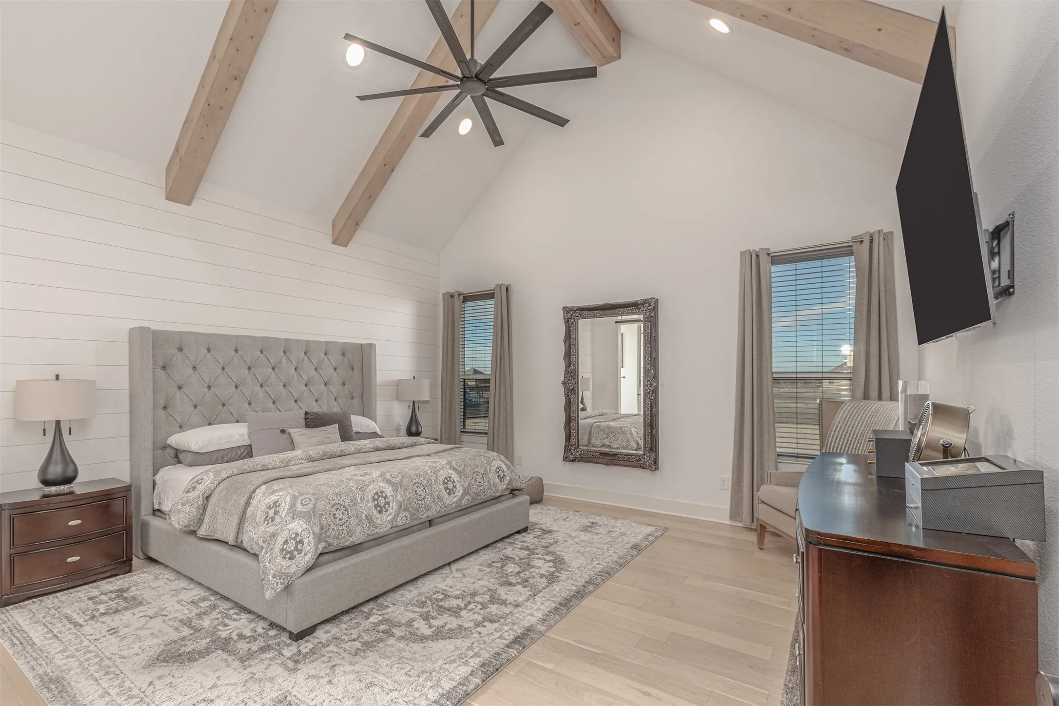 Primary Bedroom with Vaulted Ceiling and Stained Beams