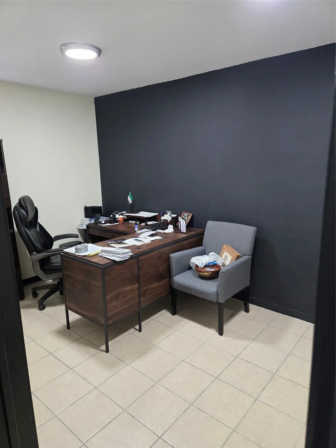 Office featuring light tile patterned floors