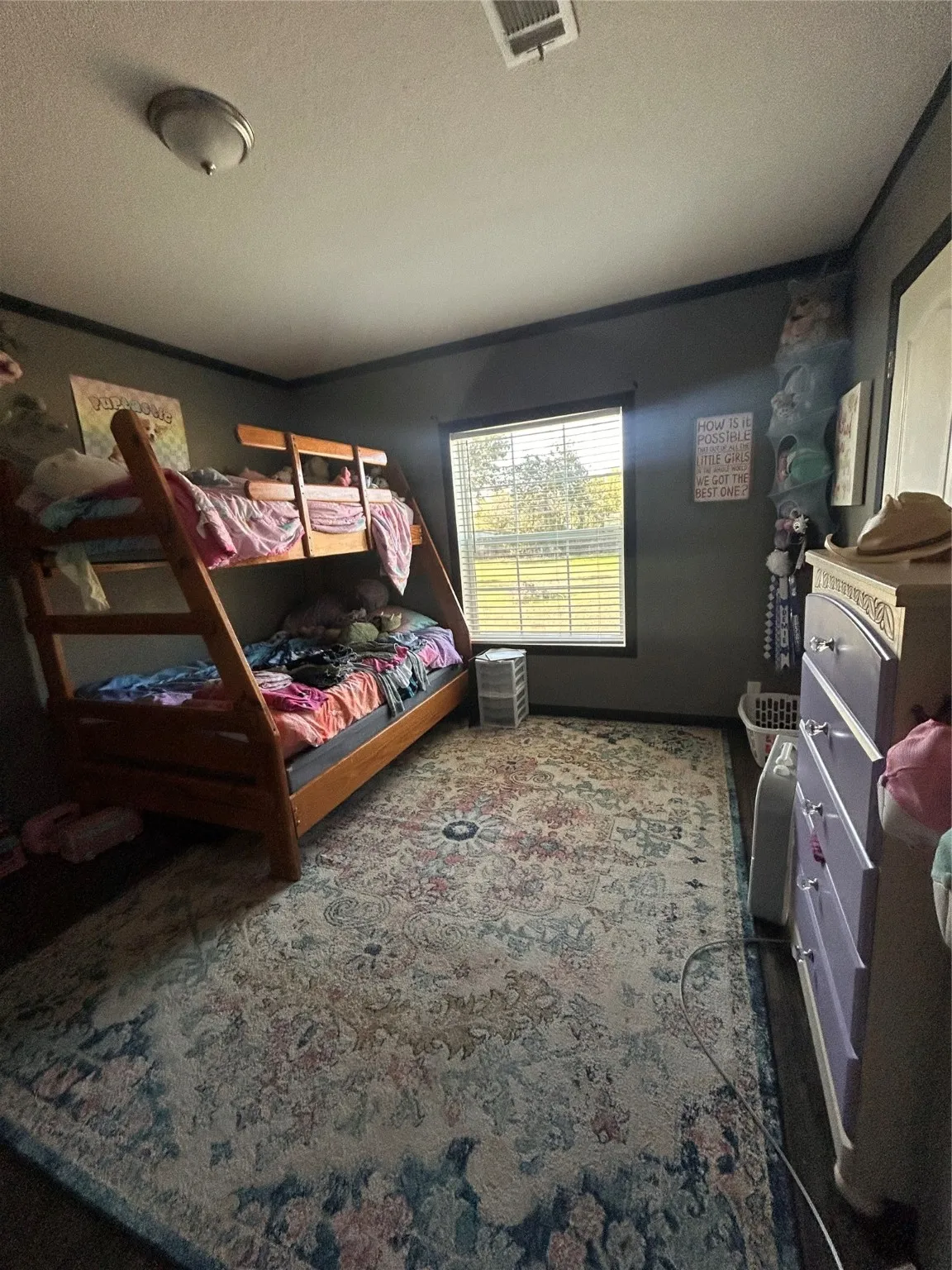 Bedroom with a textured ceiling