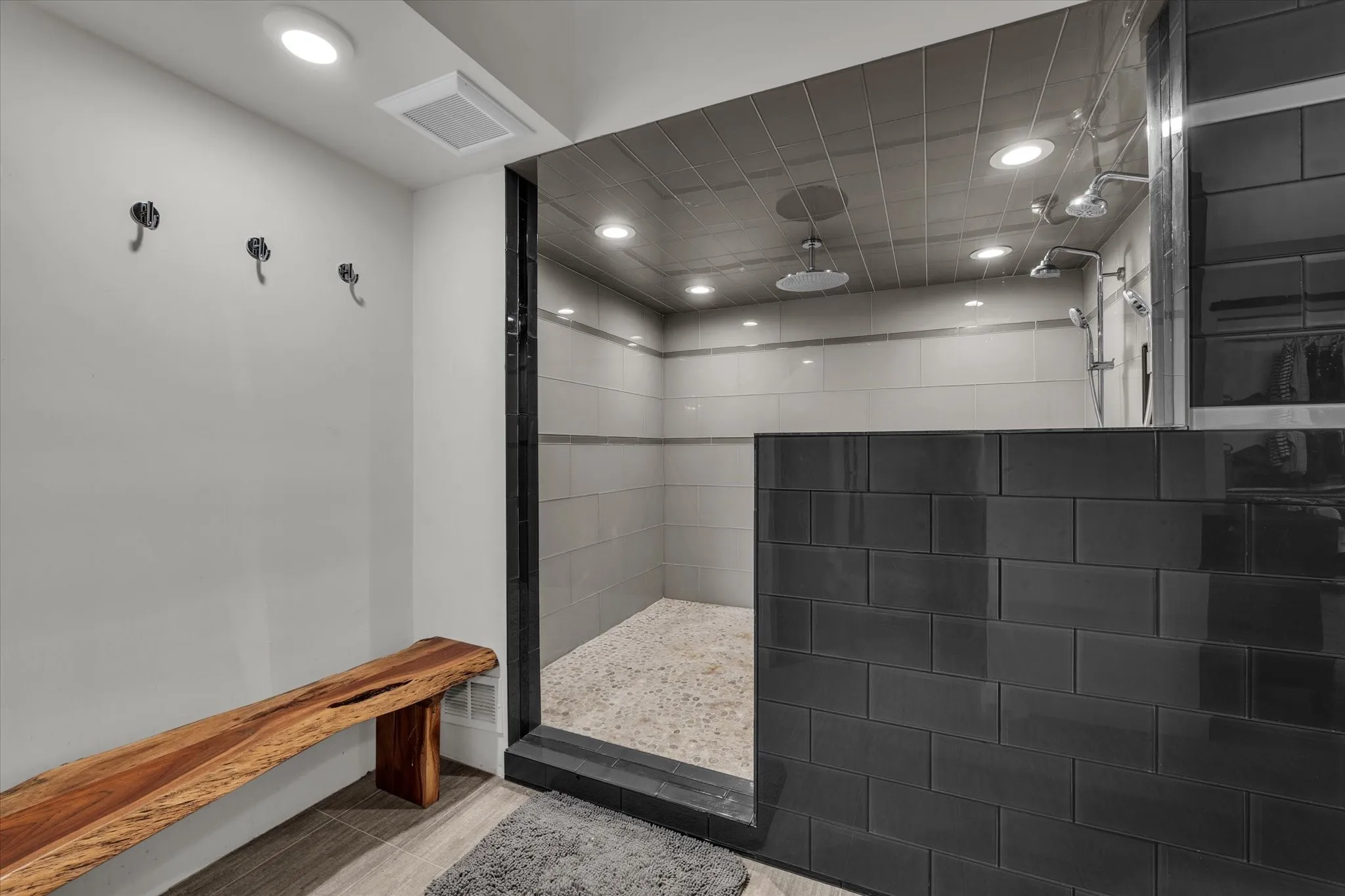 Bathroom featuring walk in shower and recessed lighting