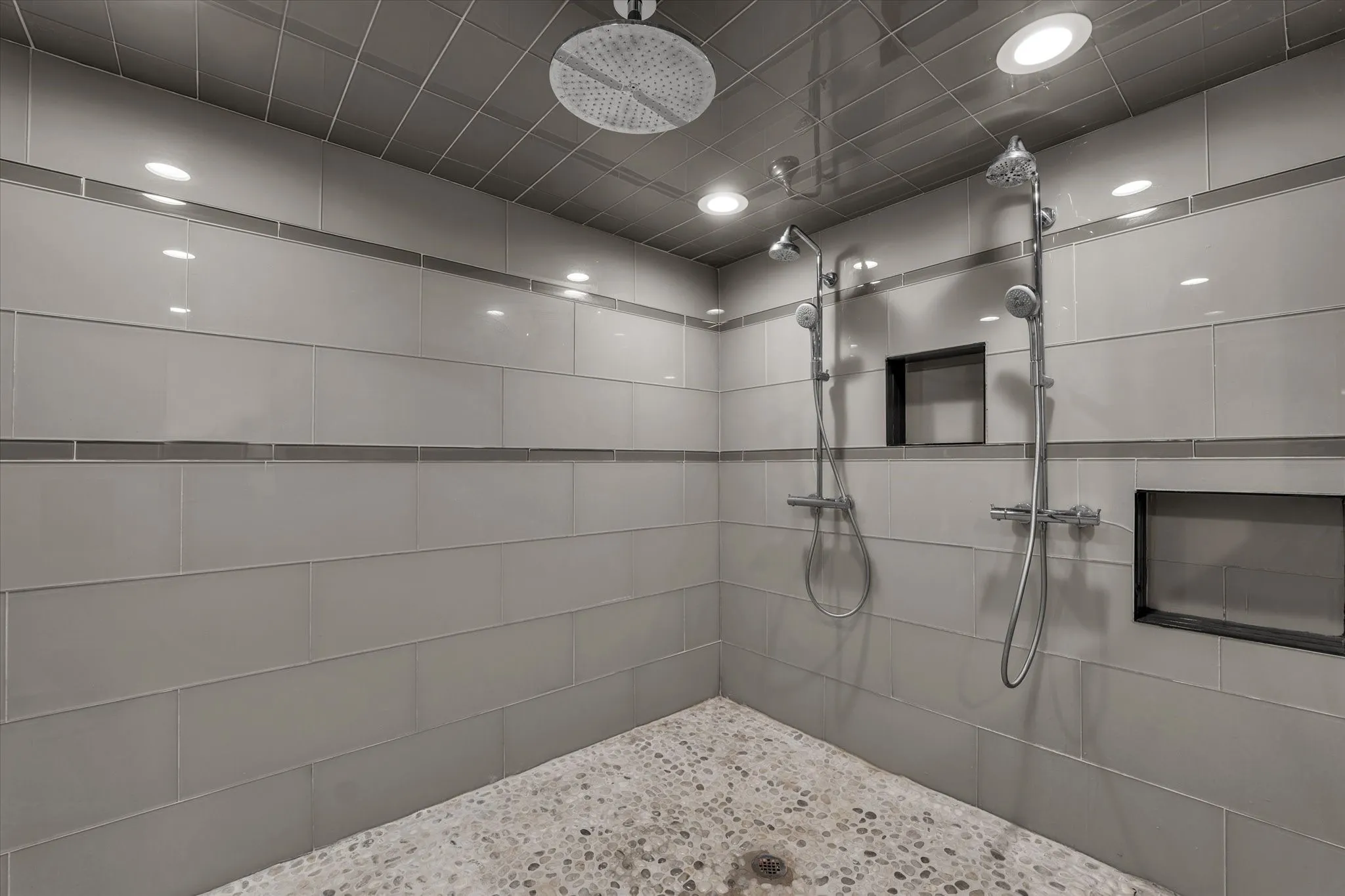 Bathroom featuring tiled shower