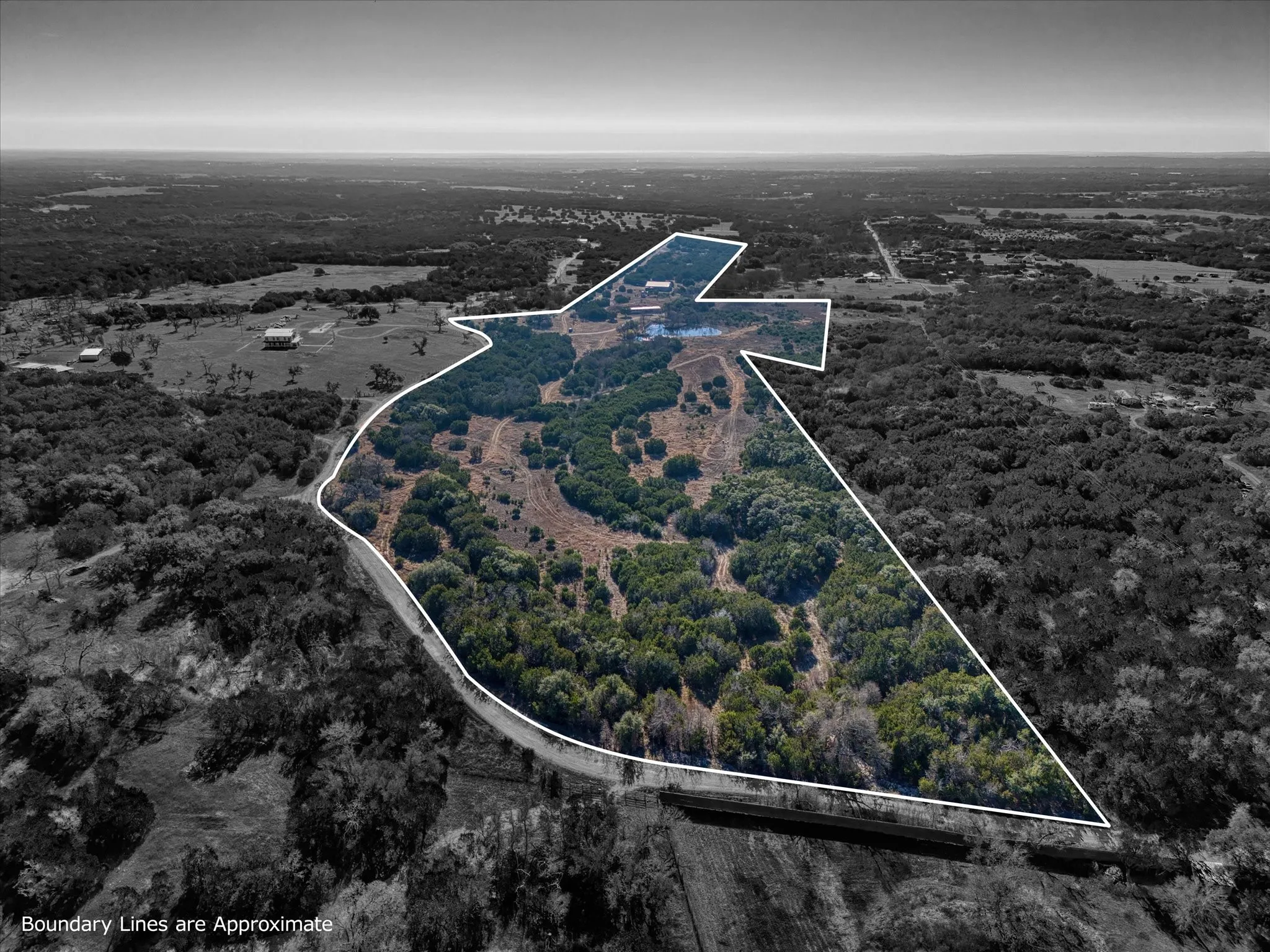 Aerial overview of property's location with property boundaries highlighted
