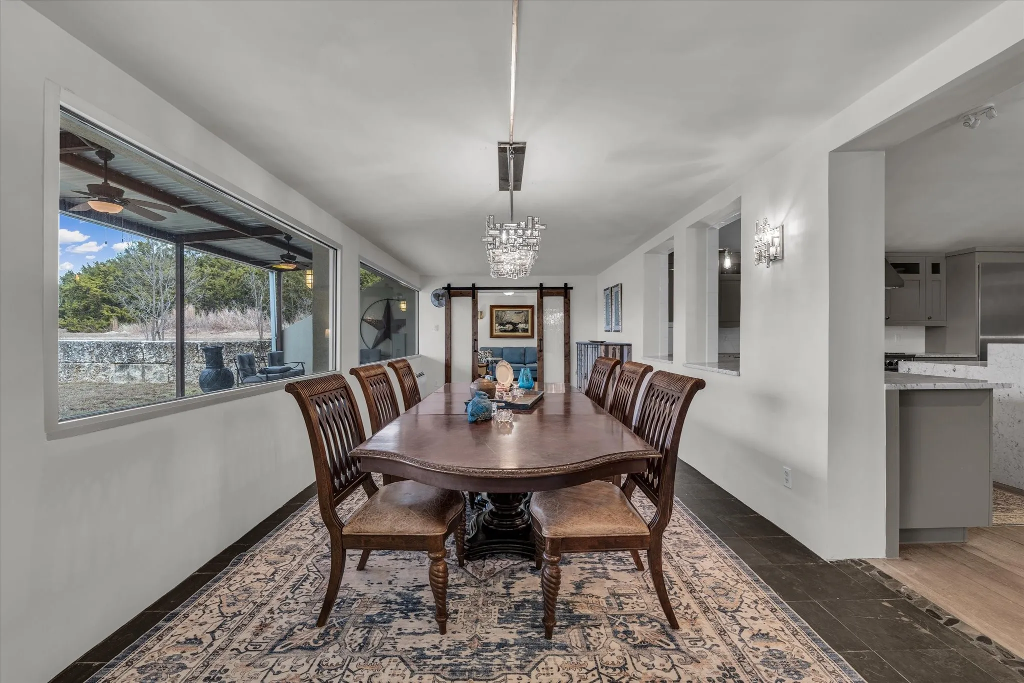 Dining area featuring a barn door