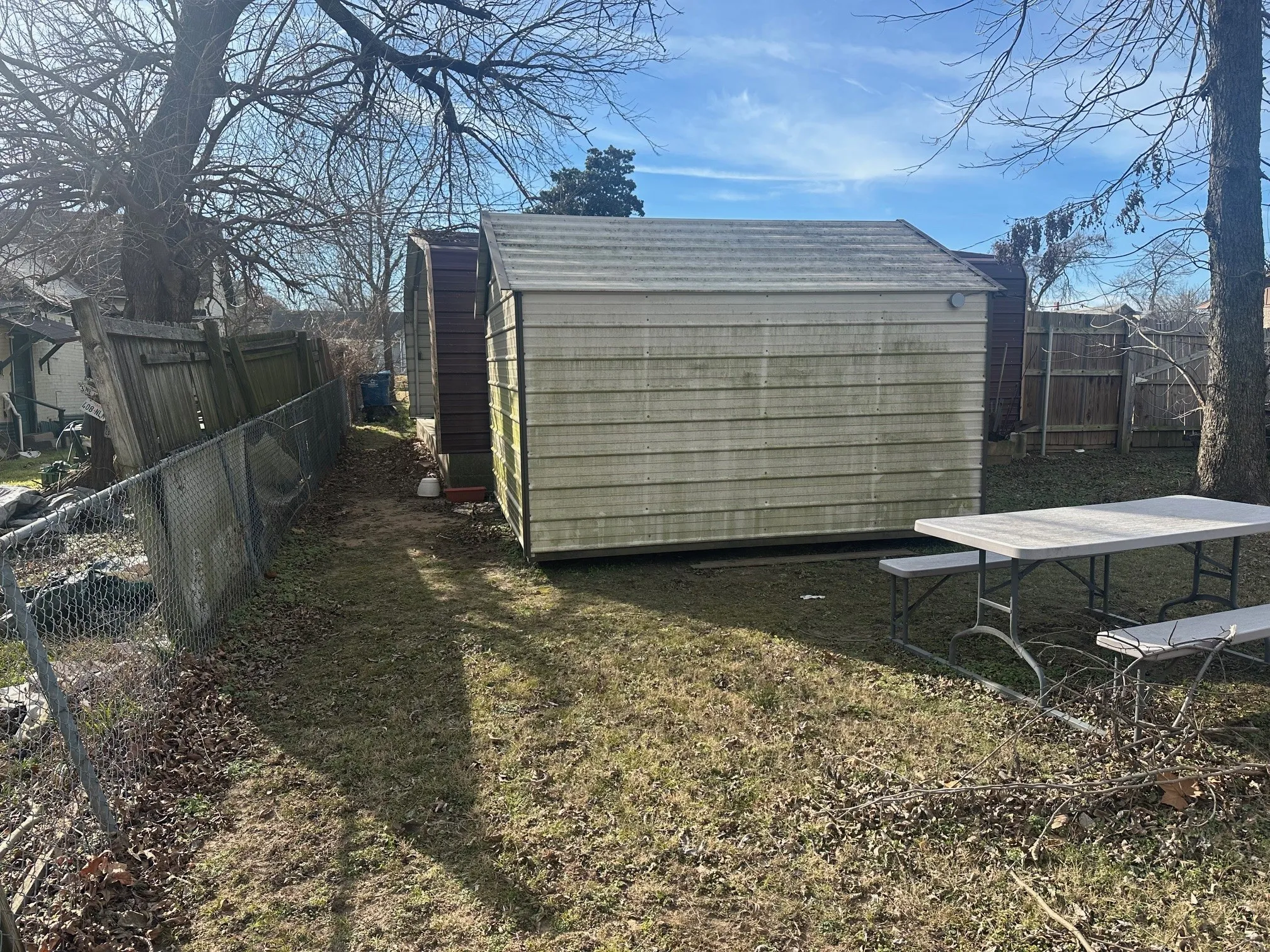 Storage shed conveys with sale.  Wired and lighting installed.