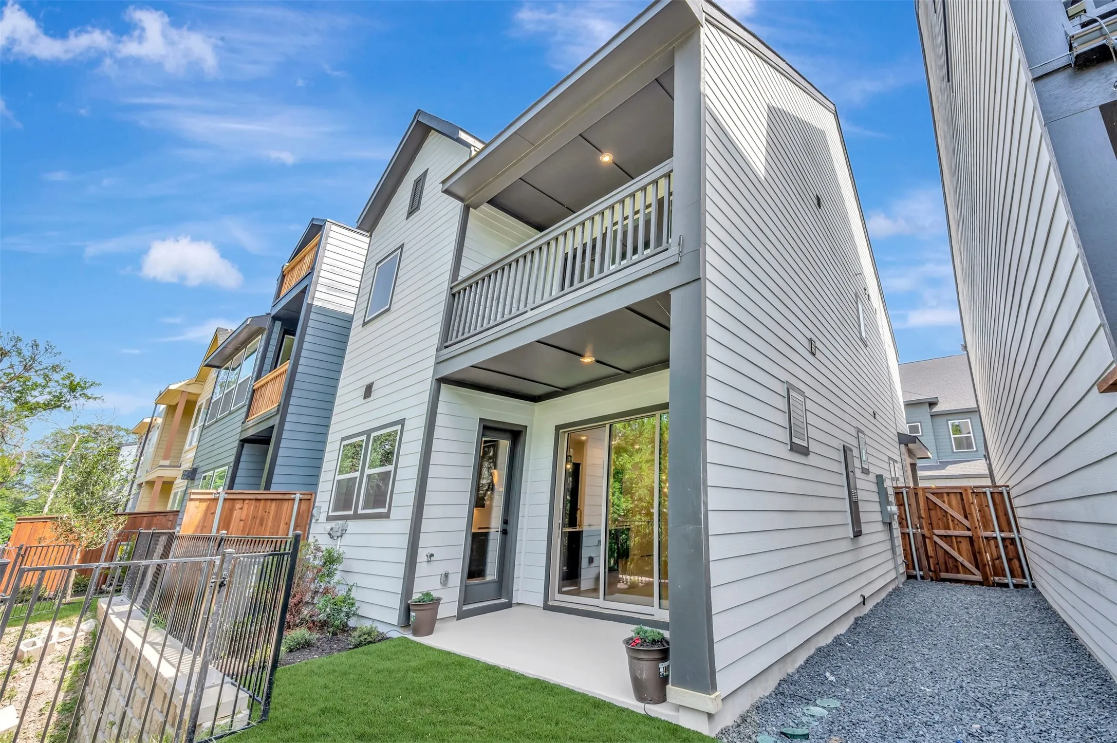 Contemporary multi-story exterior with horizontal siding and dark trim accents
