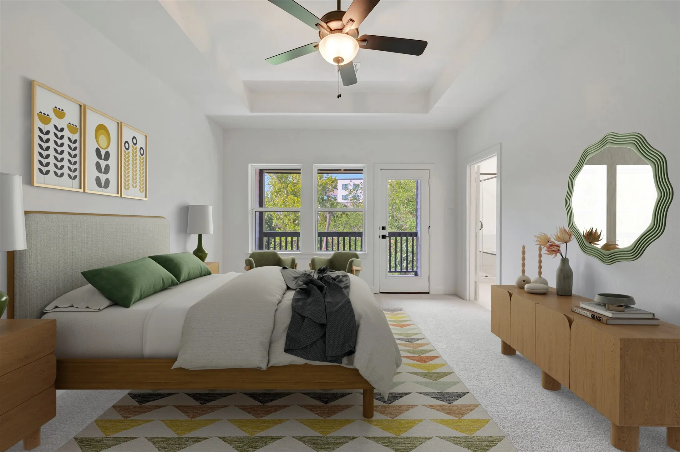 Room with tray ceiling and ceiling fan, featuring a private exterior door to a balcony with black railings