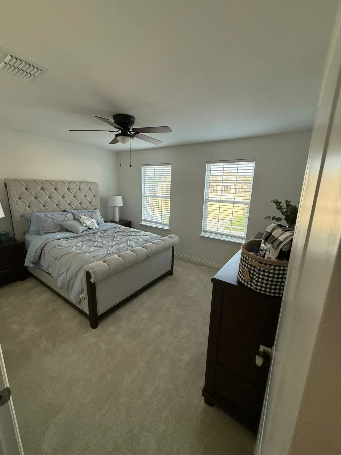 Bedroom with carpet flooring and ceiling fan
