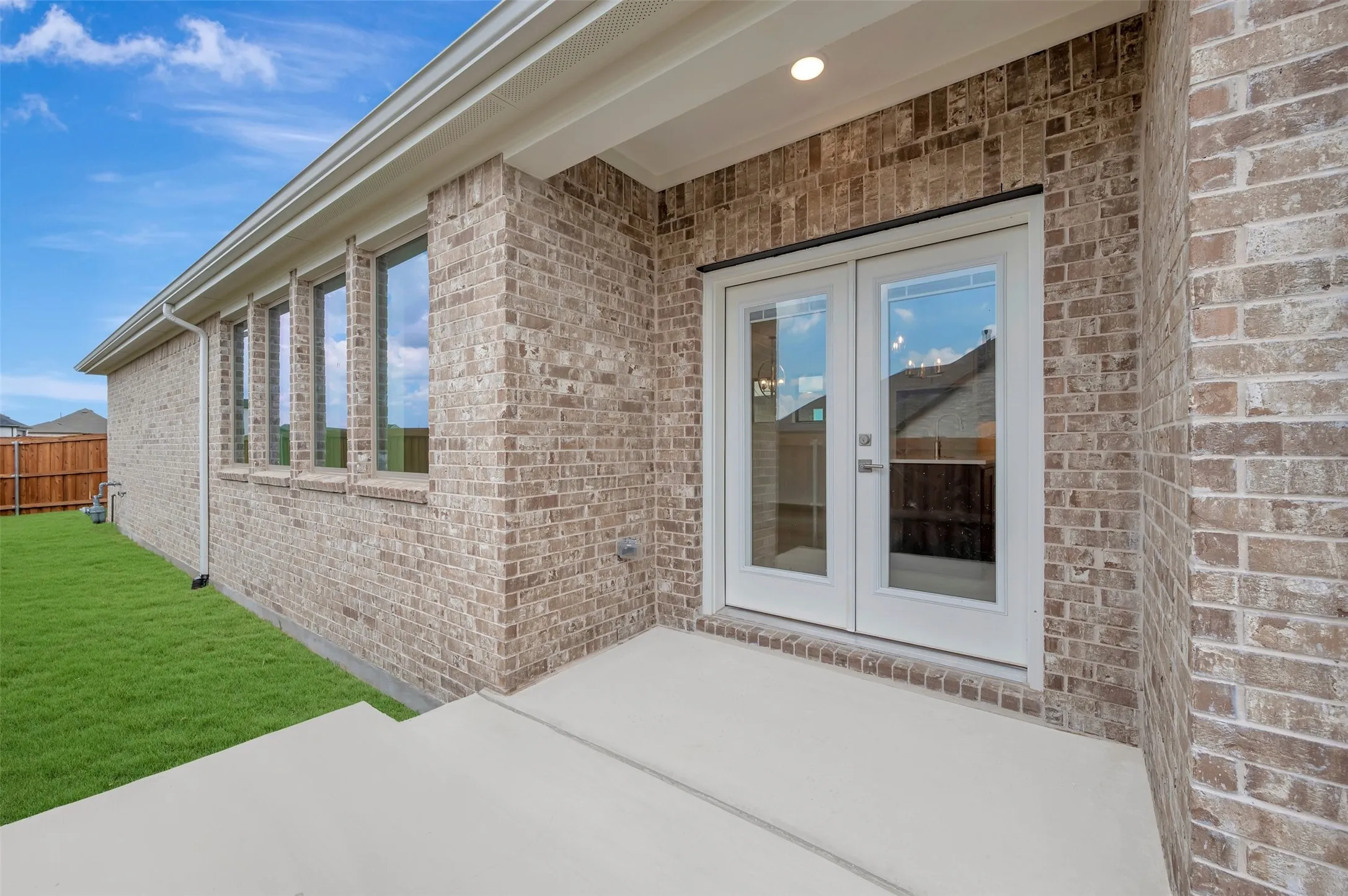 Covered patio featuring a concrete slab and recessed lighting