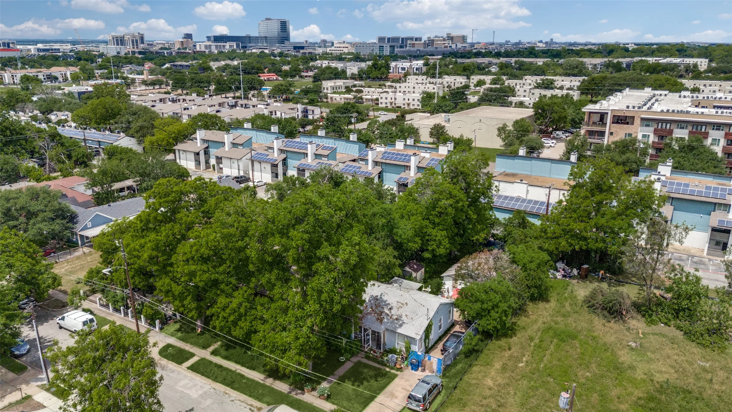 View of property location with nearby urban area