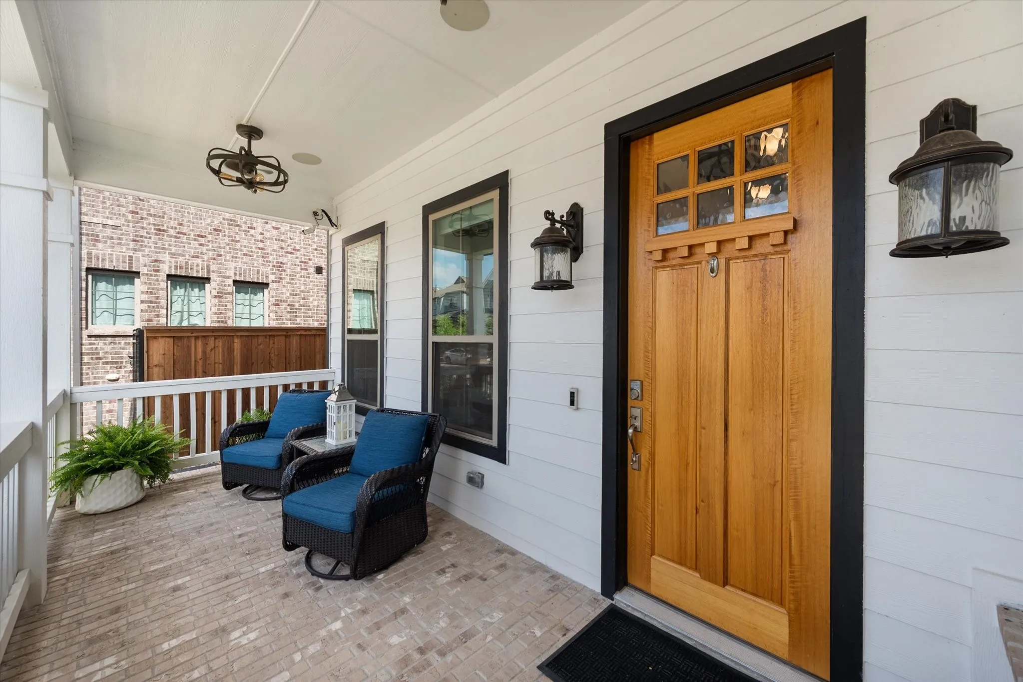 View of exterior entry featuring covered porch