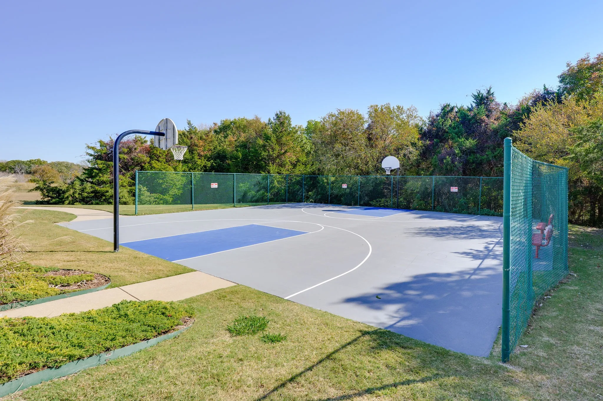 View of basketball court featuring community basketball court