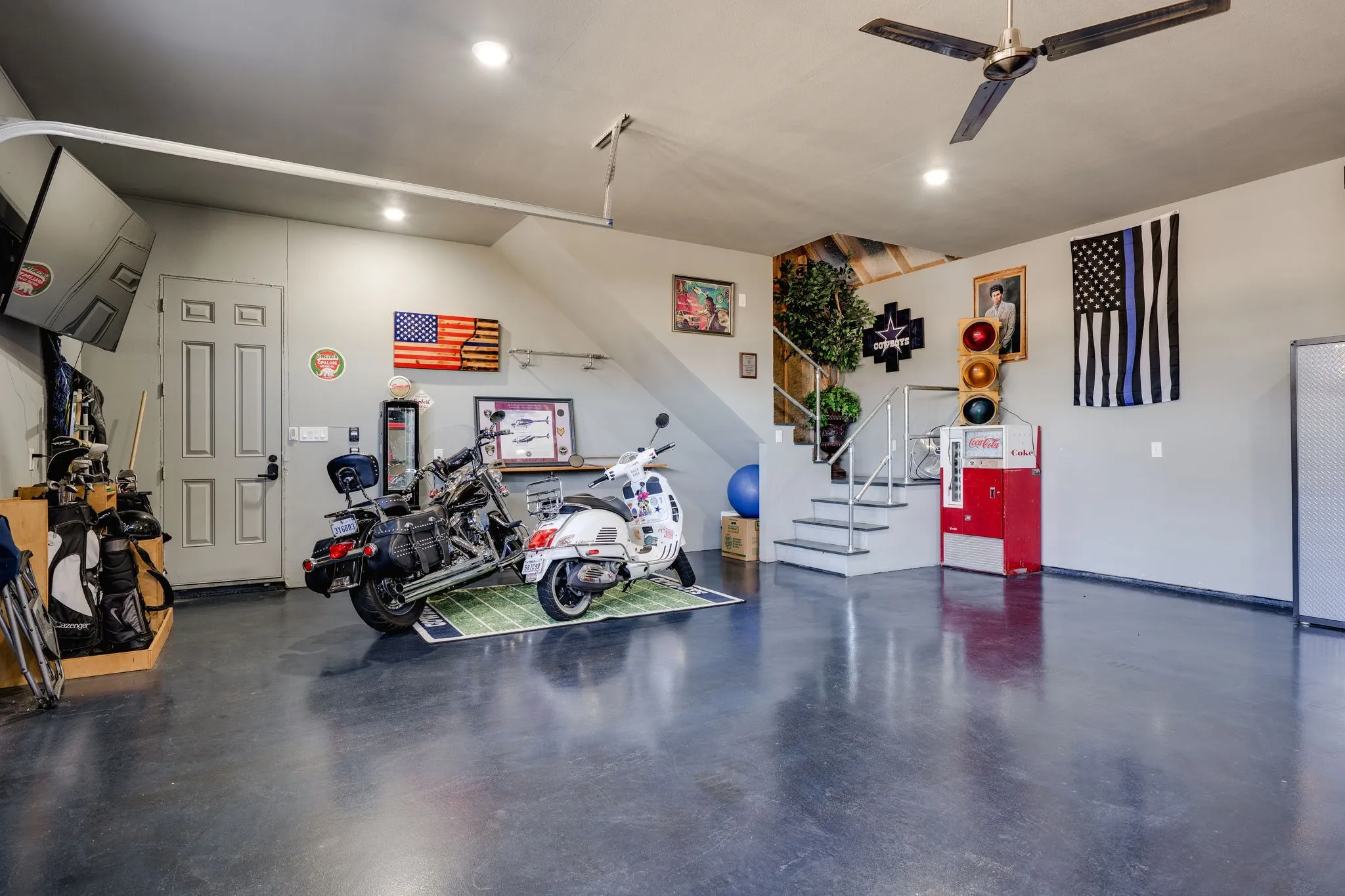 Garage featuring ceiling fan and recessed lighting